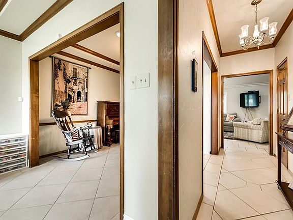 Formal dining and hallway to family room