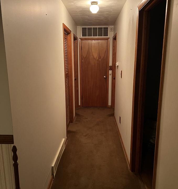 Hallway to the 3 bedrooms
