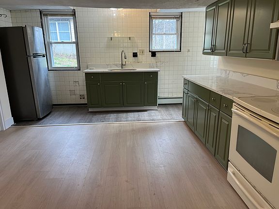 Kitchen with bran new Quartz countertops