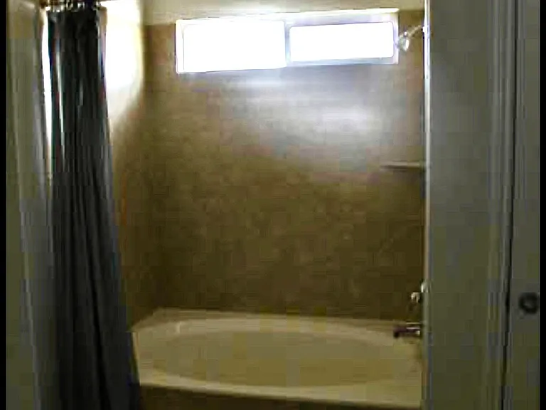 Master bath with walk-in closet