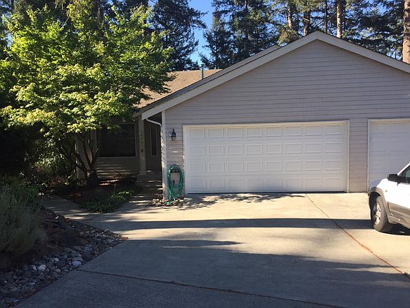 Two car garage w/one step access into laundry room.
