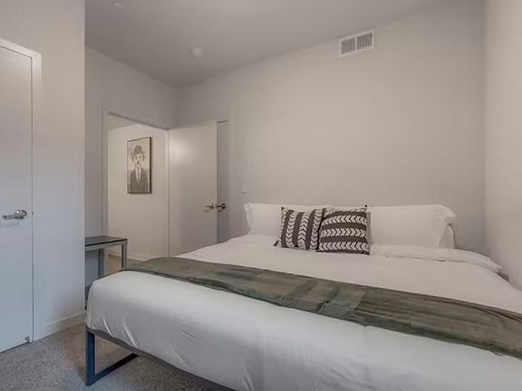 Get some rest in one of the five rooms! This room is equipped with a king bed.