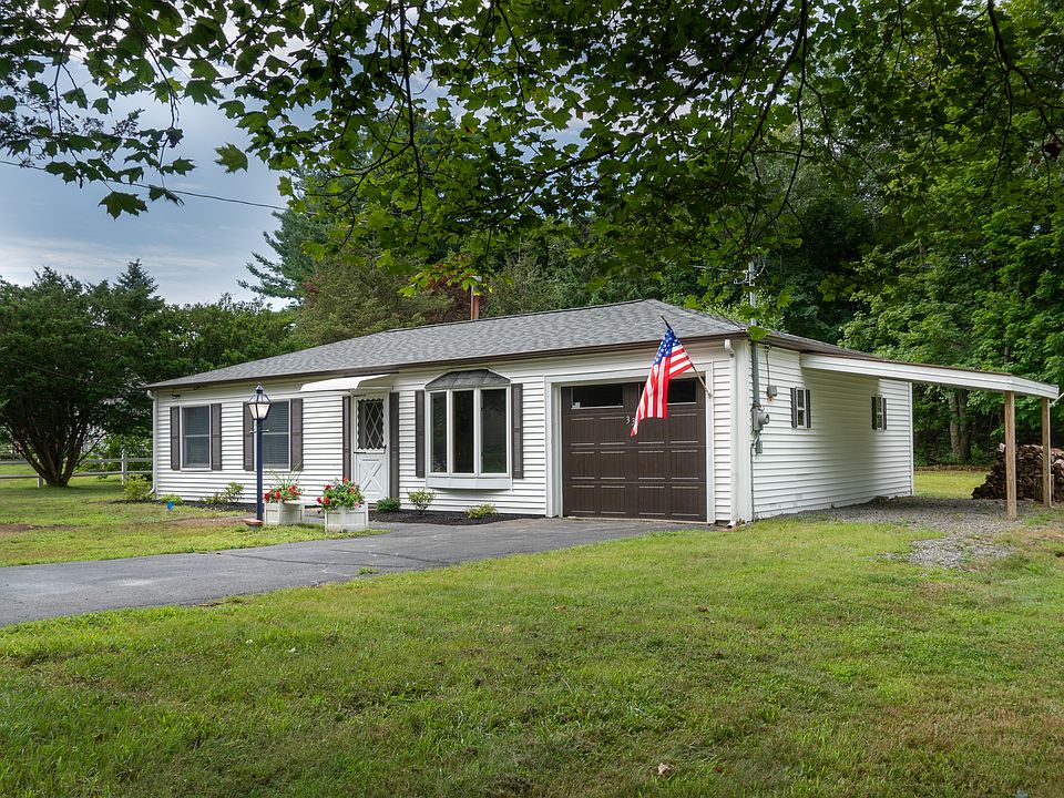Front View with Carport