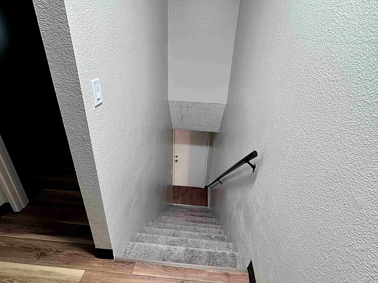 Townhome style apartment with bedrooms upstairs.