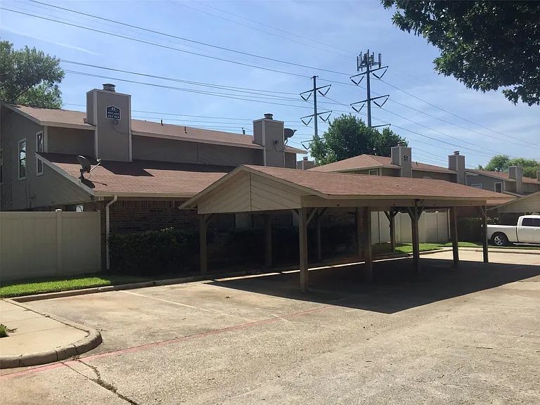 1 reserved covered carport parking spot per condo, remaining spots are uncovered