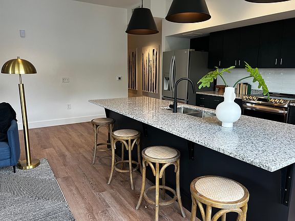 Enormous kitchen island with comfortable seating for 4