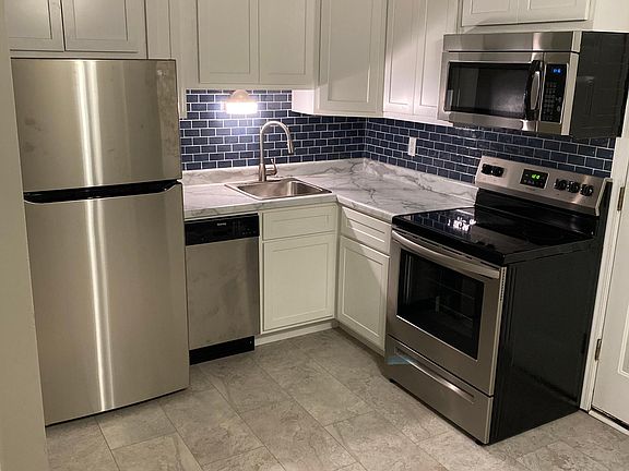 kitchen - all new stainless Steele appliances, dishwasher and backsplash. New flooring - vinyl plank with tile-like finish