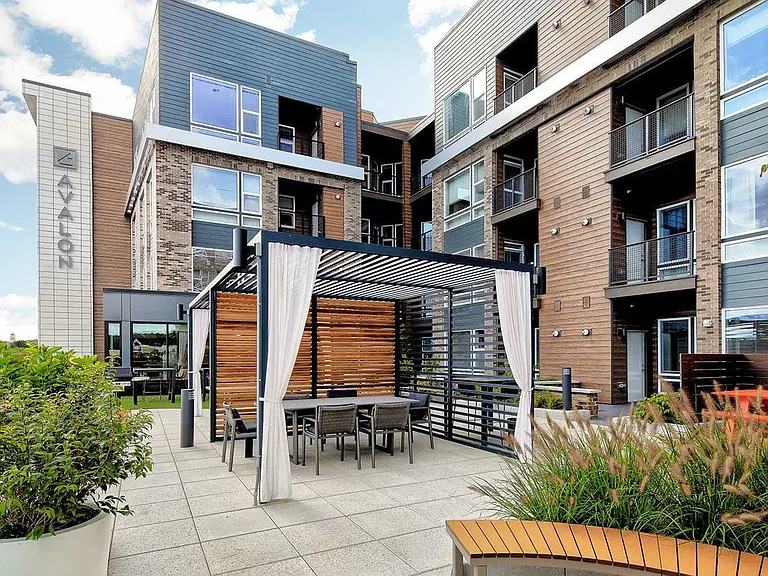 Third Floor Courtyard with Grilling Space and Multiple Seating Areas