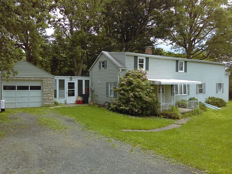 Front of house including garage