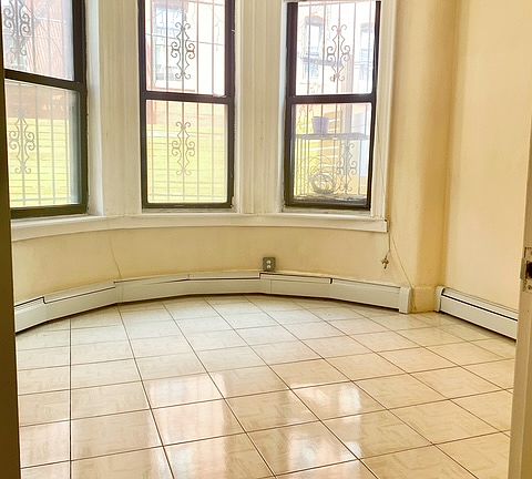 5th image of 6085 Putnam Ave