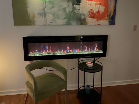cozy sitting area with electric fireplace (included w/ condo)