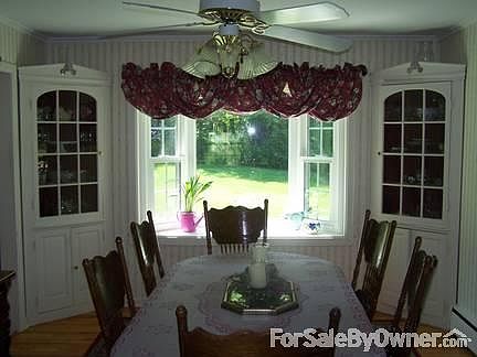 Dining Room (13' X 12')
						:
						Has built in corner cupboards, a bay window and a ceiling light/fan.