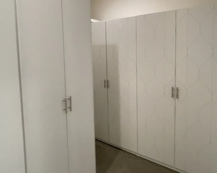 3rd floor - Primary bedroom with bathroom, large walk in closet with built in storage cabinets