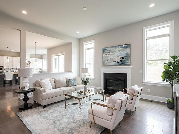 Family room is spacious and offers a fireplace