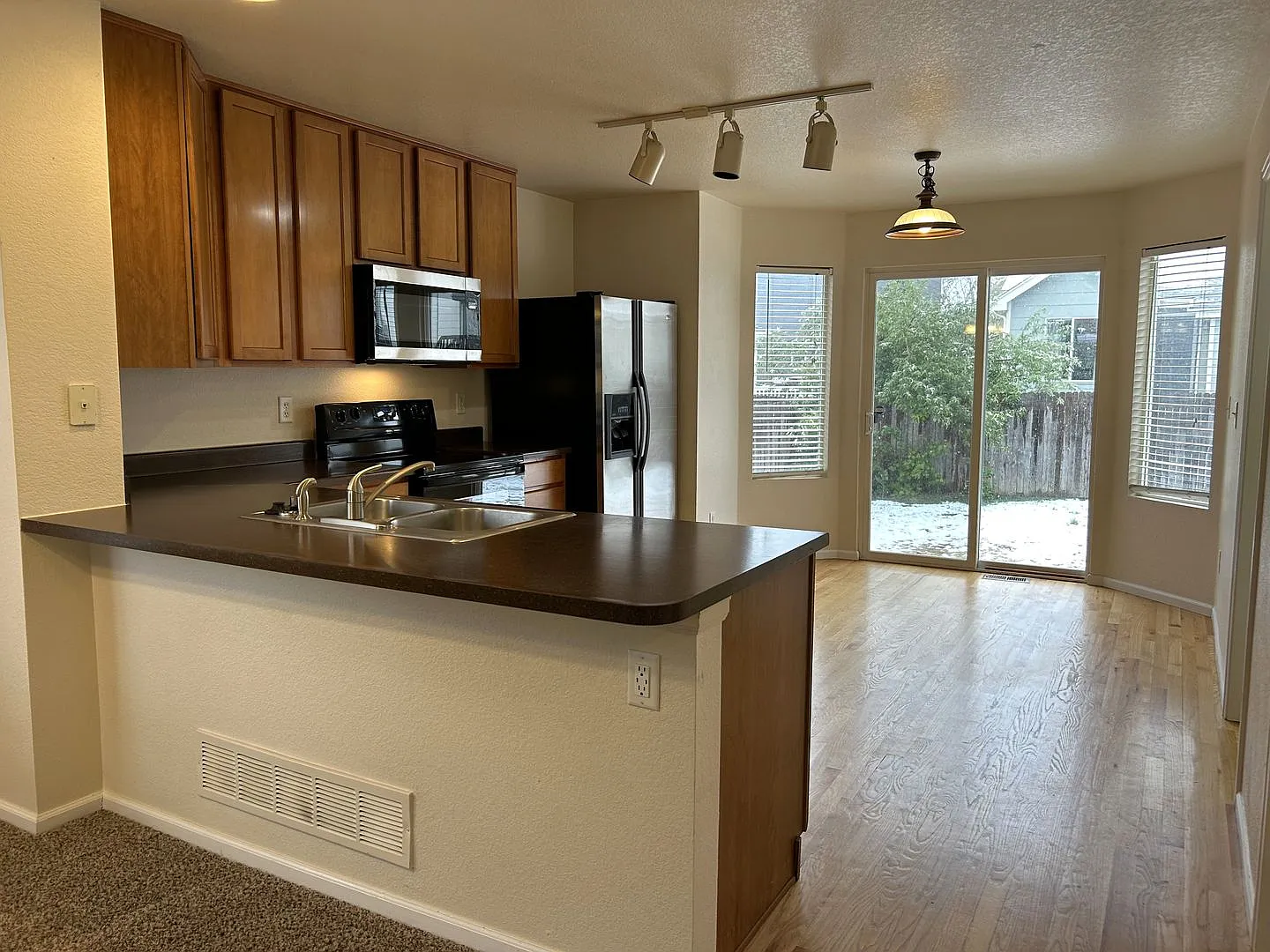 $200 Off First Month! Spacious 3-Bedroom Home with Fenced Yard Available Now — Photo 4