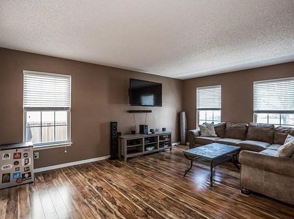 Gorgeous wood floors all throughout the open concept