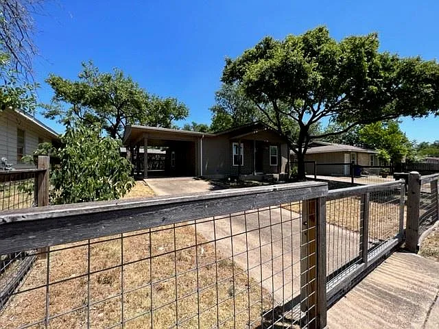 Building Photo - 7909 Lazy Ln #A