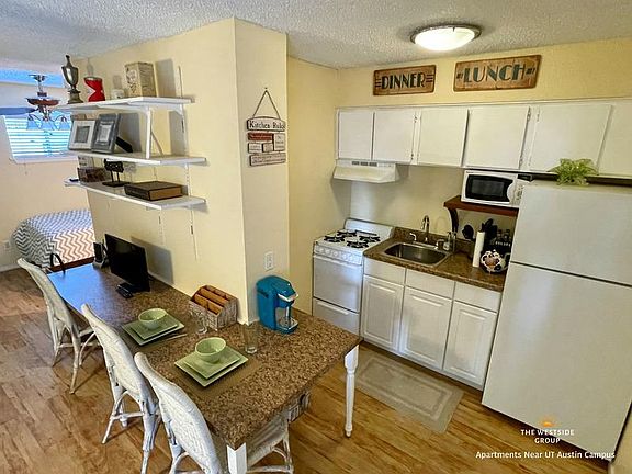Kitchen with built-in dining table/desk