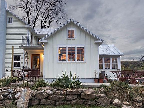 East Elevation
Main house- Kitchen addition over where the old well was in a shed attached to the house for convenience. (We have a new well now) :)
The railing on 2nd level is for the Balcony from the Second Floor East Bedroom