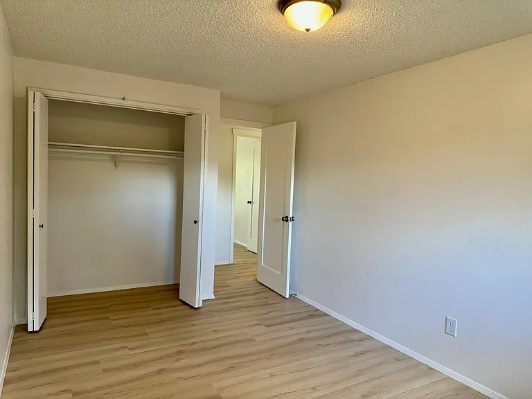 Bedroom with full closet