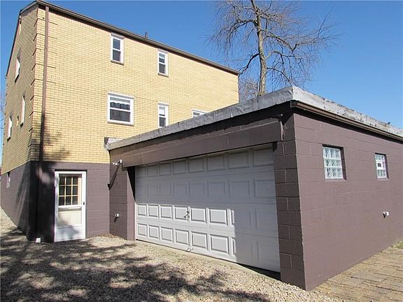 It has an Oversized Attached Two Car Garage too!