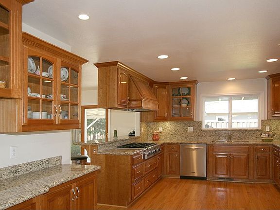 Kitchen with custom cherry cabinets & built-in hutch