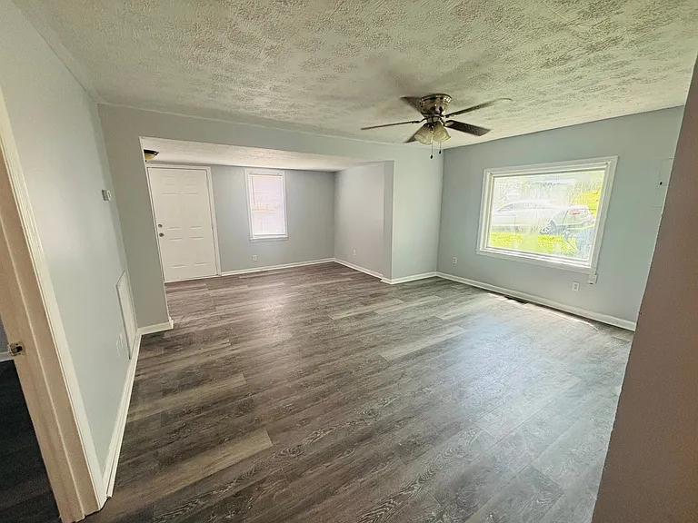 Big open living room with lots of lighting
