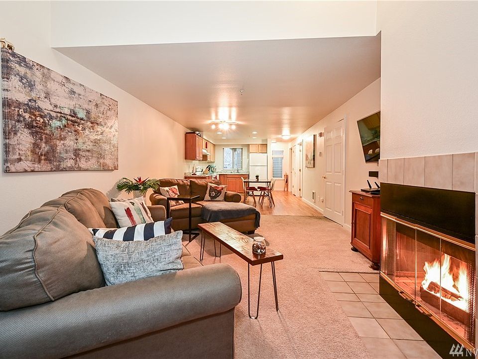 WELCOME HOME to this beautiful, inviting and nicely updated first floor condo unit!  Newer laminate flooring, brand new carpets and kitchen countertops, nicely updated bathrooms along with trim and fixtures throughout.