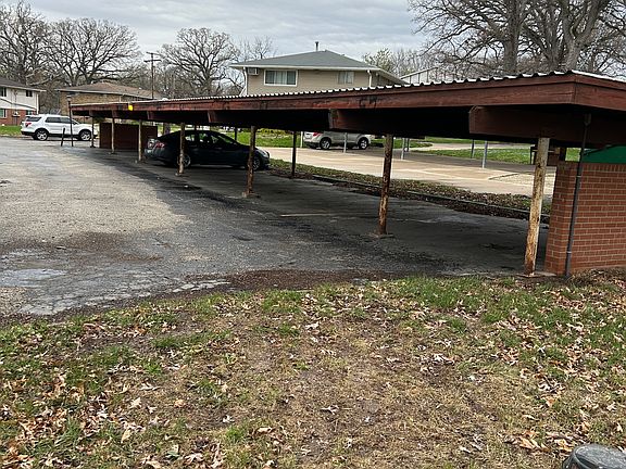 ASSIGNED CARPORT SPACE AND OPEN PARKING