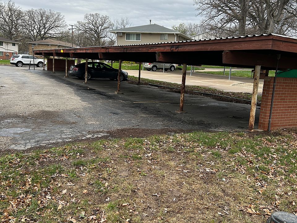 ASSIGNED CARPORT SPACE AND OPEN PARKING