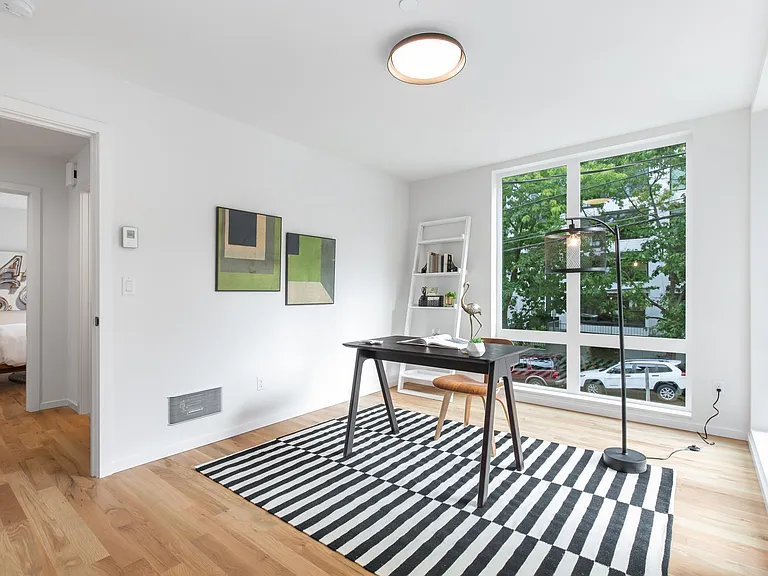 Room 1 with walk in closet + 2 large windows
