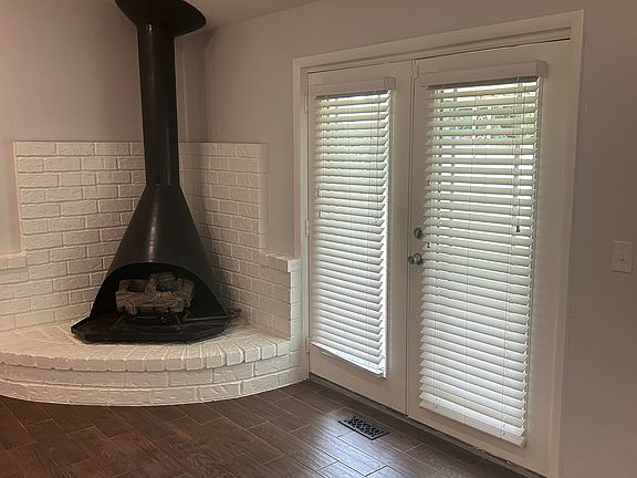 FRENCH DOORS TO BACK YARD AND COVERED PATIO