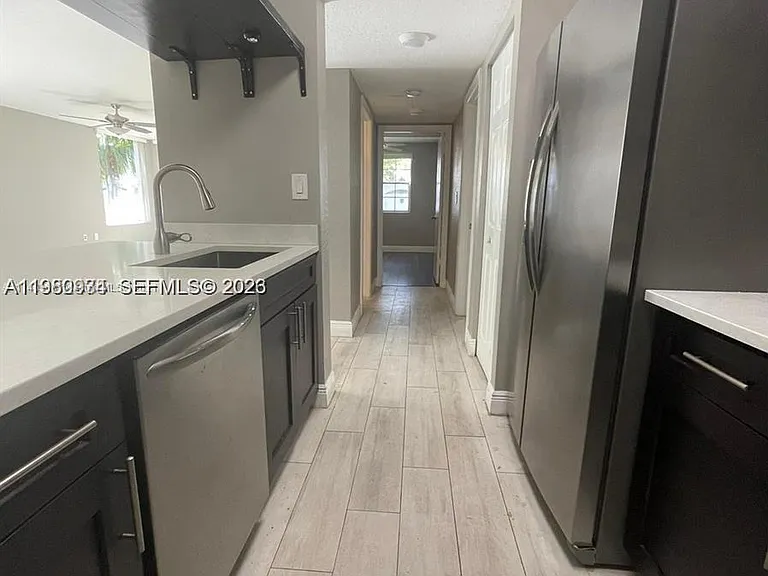 2811 N Oakland Forest Dr #110 — Photo 3