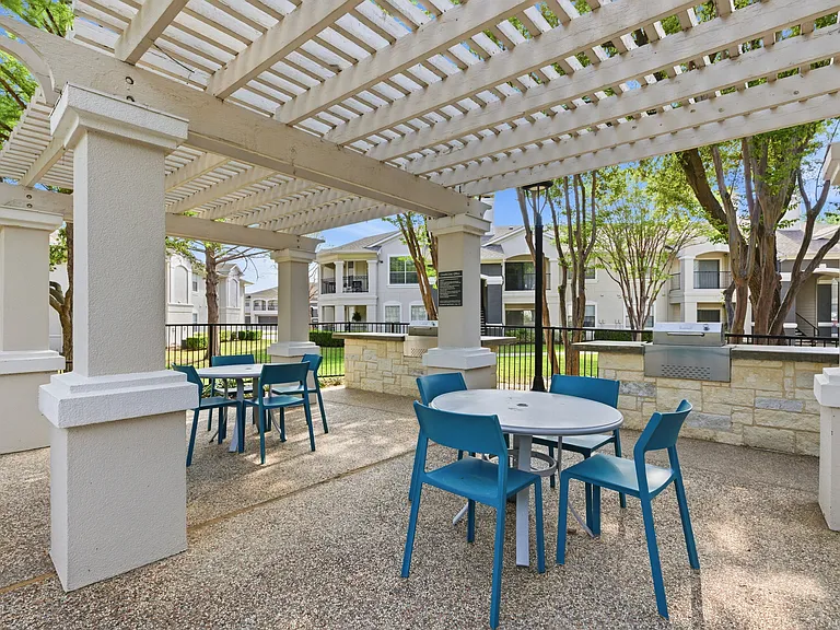Outdorr seating with tables near grills