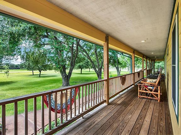 The views from the porch instill a sense of peace. Mature trees, open expanses of green...