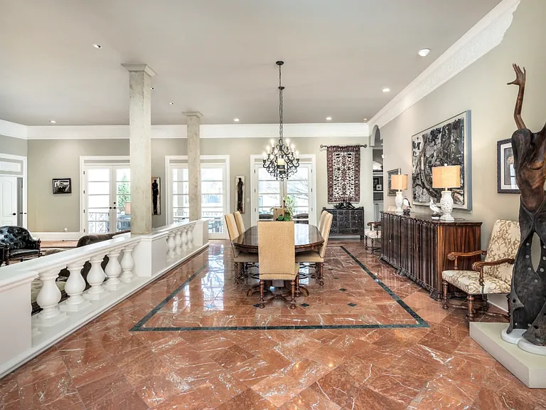 Dining room and veranda doors onto veranda and pool area