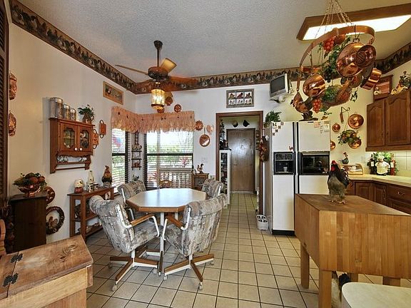 large kitchen with breakfast area