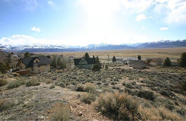 Facing west, at top of lot