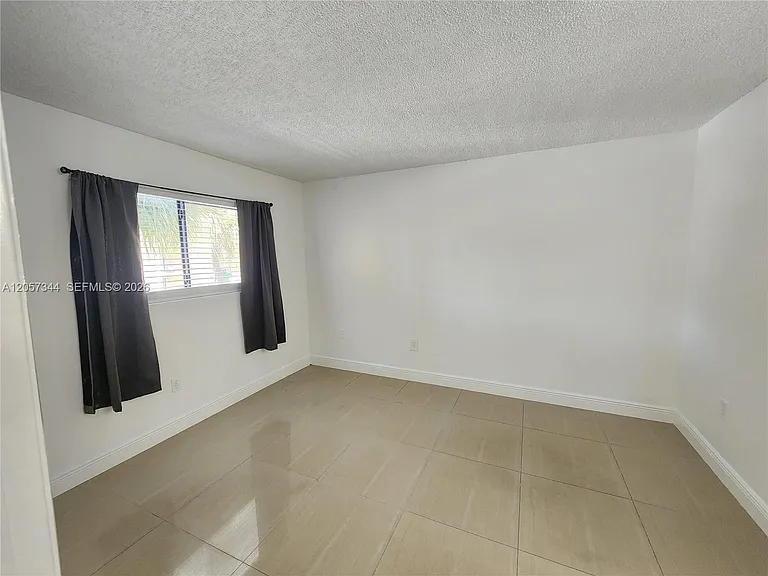 9491 Palm Cir S #205 — Photo 7