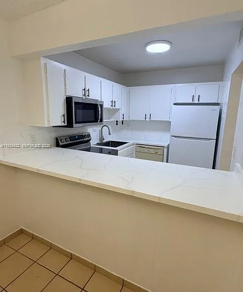 8990 SW 24th St #215 — Photo 21