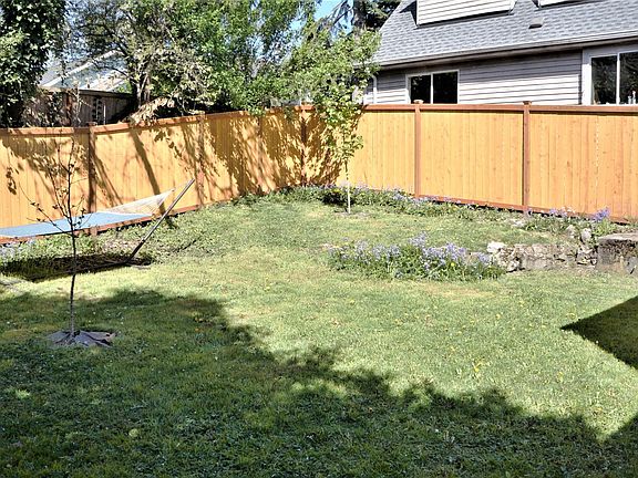 Back yard - hammock to stay as part of rental.