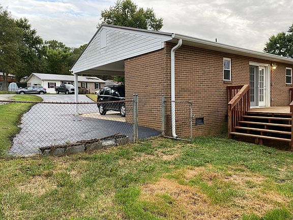 Back Yard and side parking adjacent to carport