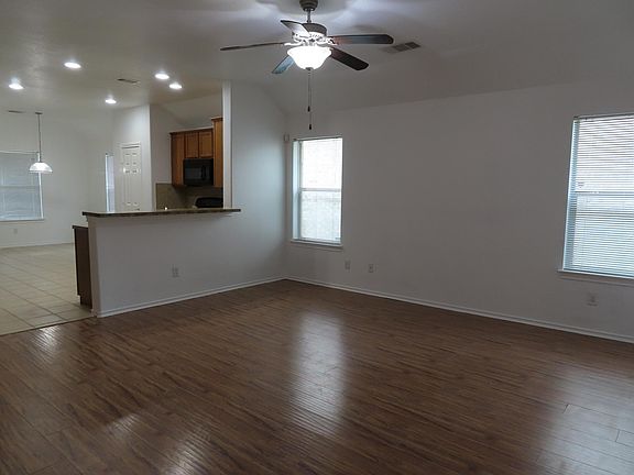 Living room with view of the kitchen