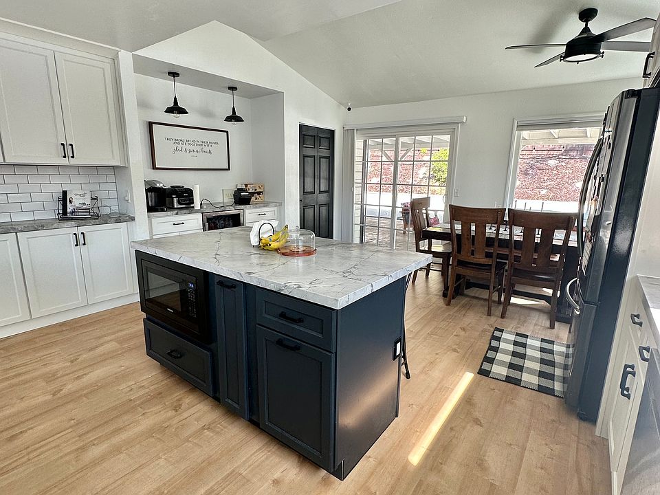 Kitchen with island and ample counter seating