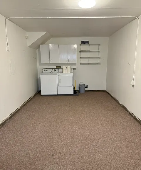 Attached garage accessible from inside the unit. Include in unit washer and dryer. Great for a work from home office.