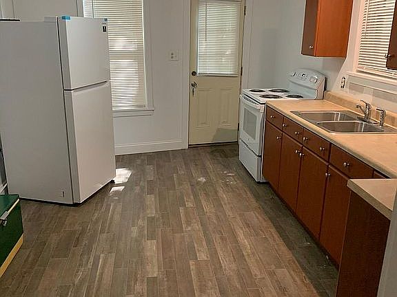 Spacious Kitchen with new cabinets and new refrigerator & stove