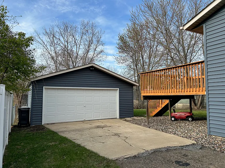 2 stall garage, deep with space for storage. Large size deck