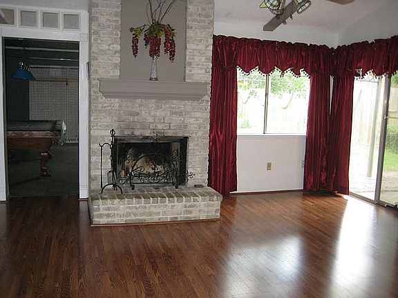 The fireplace is the focal point as you walk in the front door.