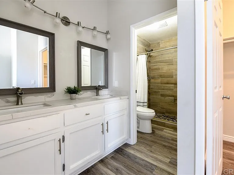 Master bathroom with dual sinks