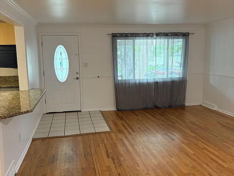 view looking to front door from dining area